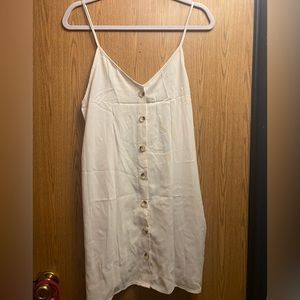 Neutral dress with pockets